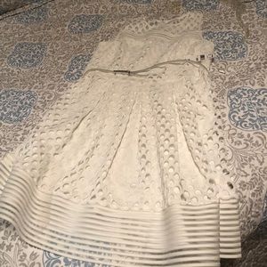 Pretty white dress perfect for a spring event.